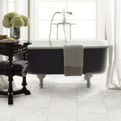 marble tile floors in a bright bathroom